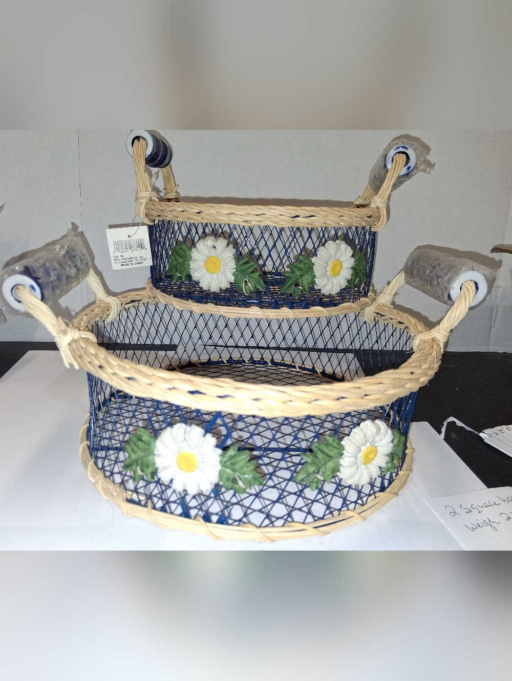 Two Blue Wicker Baskets with Daisy Accents